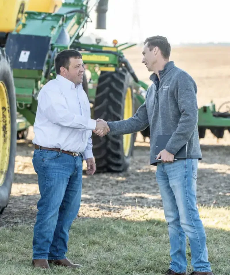 Farmers shaking hands. 
