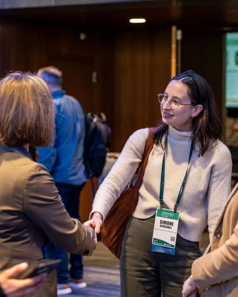 Farming Advisor at an agricultural conference 